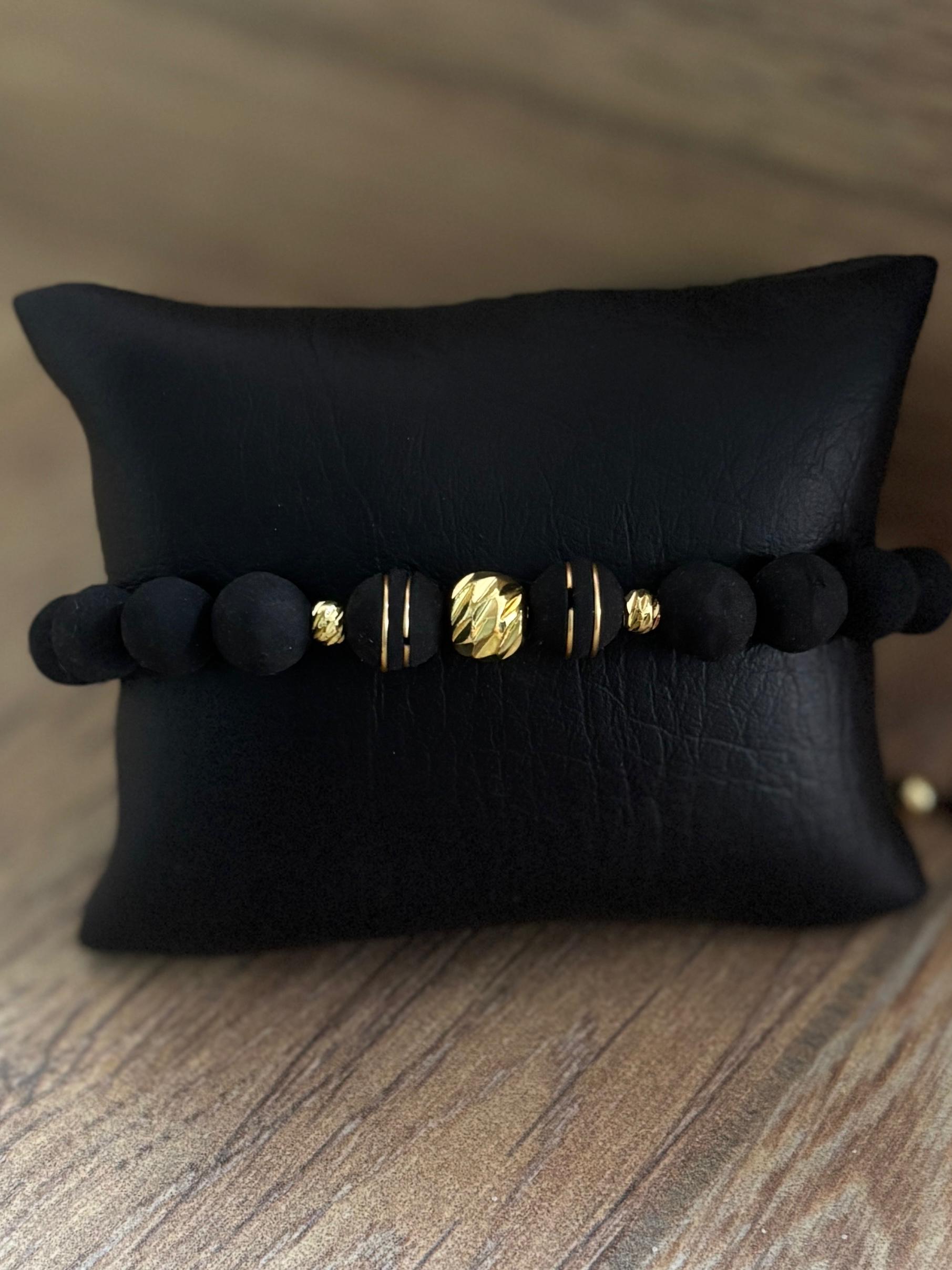 MDE Pulsera Individial Negra Dorada